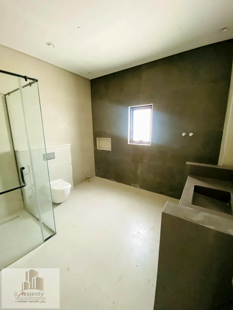 The Al-Houshi area has a modern two-story villa available on an area of 10,000 square feet in the Emirate of Sharjah, with excellent spaces and elegan63205334373890112