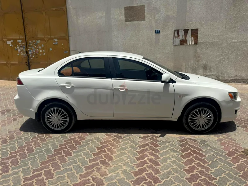 ميتسوبيشي لانسر EX....... مالك واحد63224788570371114