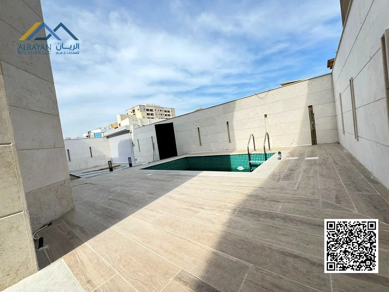 Luxurious villa with a large swimming pool, 5000 square feet, in Al Rawda area, freehold for all nationalities63874051375873114