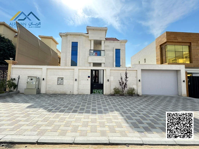 Luxurious villa with a large swimming pool, 5000 square feet, in Al Rawda area, freehold for all nationalities63874051375873110