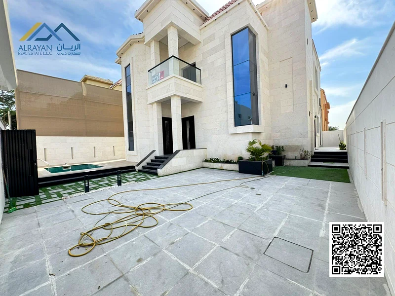 Luxurious villa with a large swimming pool, 5000 square feet, in Al Rawda area, freehold for all nationalities63874051375873112