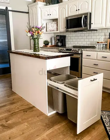 Stylish Kitchen Island with Hidden Trash Bins