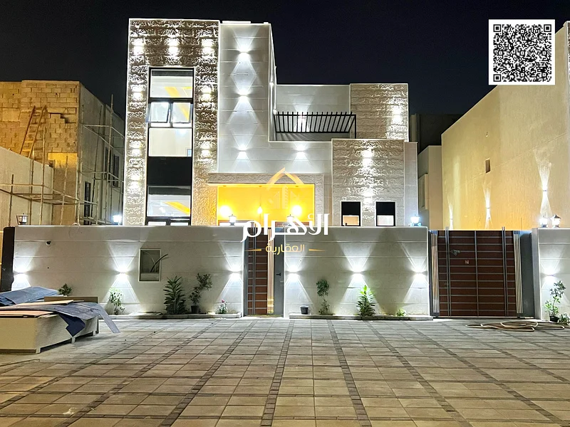 A villa with a price including registration and ownership fees on the main street, ready for occupancy in the most upscale areas of Ajman, freehold fo63900609177859110