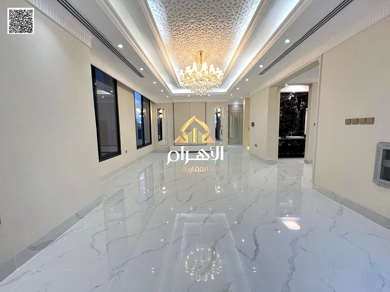 فيلا فاخرة بتصميم كلاسيكي في موقع ممتاز أمام مجمع أذها، وبسعر يشمل رسوم التسجيل ونقل الملكية، بدون63902225275779112