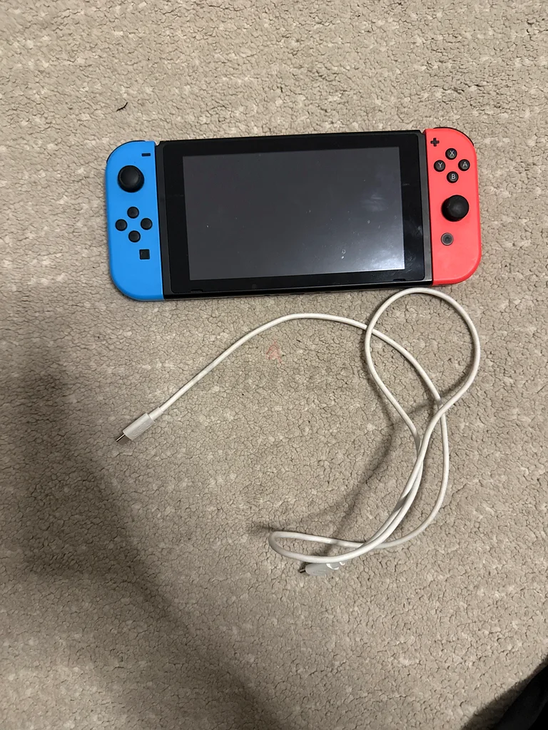 Nintendo Switch Console with Charging Cable - Ready for Play!63229685492610110