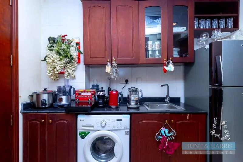 ستوديو للبيع في قرية الحمرا - بإطلالة على البحيرة وملعب الجولف63860715451523112