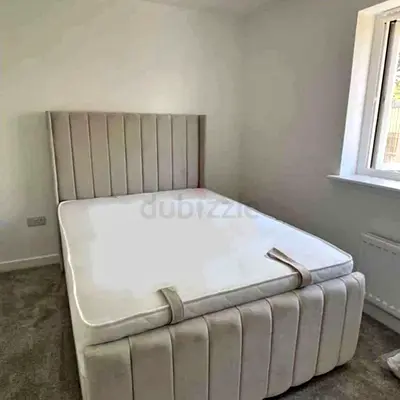 Stylish Queen Size Bed with Elegant Headboard