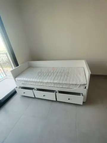 IKEA Hamnes Day bed with 3 storage drawers underneath and with 2 IKEA mattresses