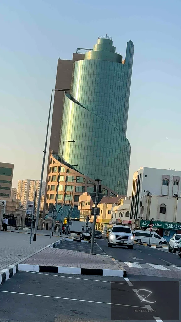 For sale, a residential and commercial building in Sharjah / Al Musalla West, ground floor + 3, next to Grand Mall63205834564353114