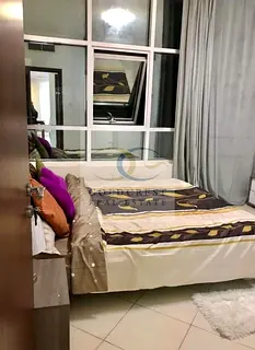 Fully Furnished 1BHK Apartment with Parking for Sale in Orient Tower, Ajman — With Flexible Paymen