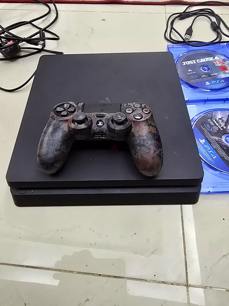 PlayStation 4 Slim Console with Games - Ultimate Gaming Experience!