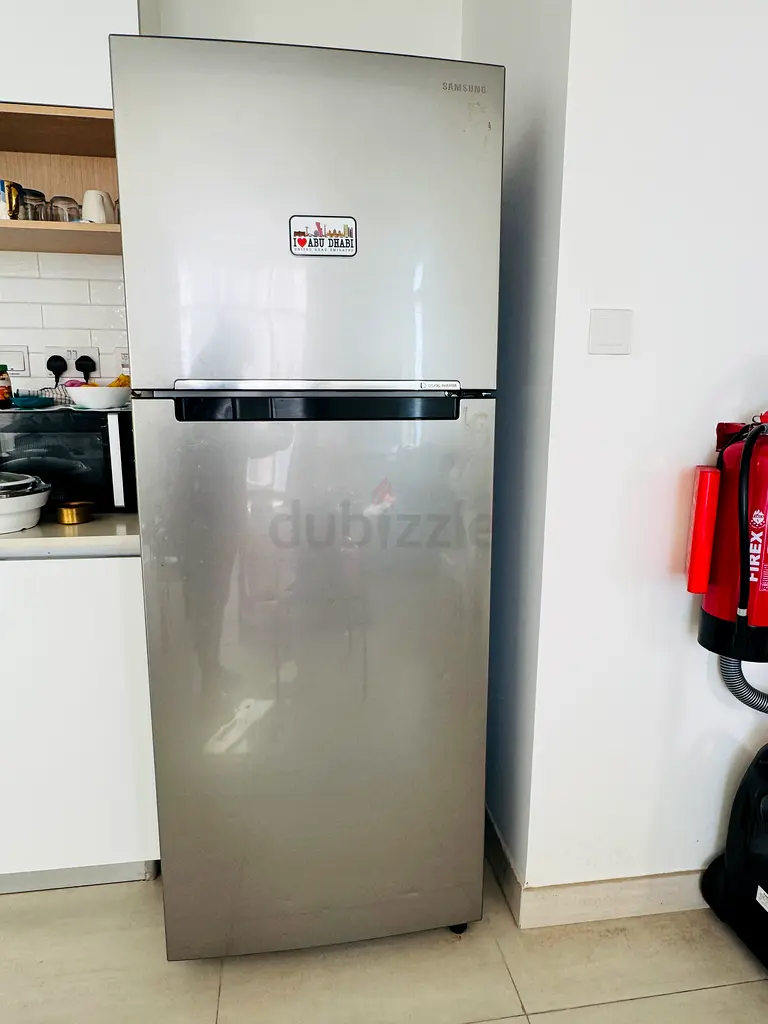 Stainless Steel Samsung Refrigerator - Excellent Condition! Price Negotiable for immediate buyer.