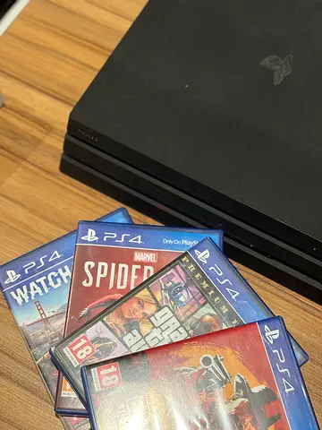 Playstation 4 pro with games used very neatly well maintained with lots of storage and 2 controllers