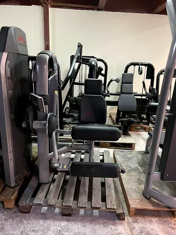 Technogym Leg Extension: Sculpt  Strengthen Your Quads!