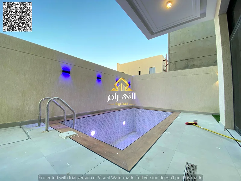 Luxurious 6-room villa with swimming pool and roof, including registration fees, in Al Helio 2, freehold, bank financing, without down payment63903721902465111