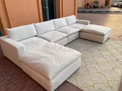 Elegant L-Shaped Sofa with Cozy Ottoman - Perfect for Your Living Room!