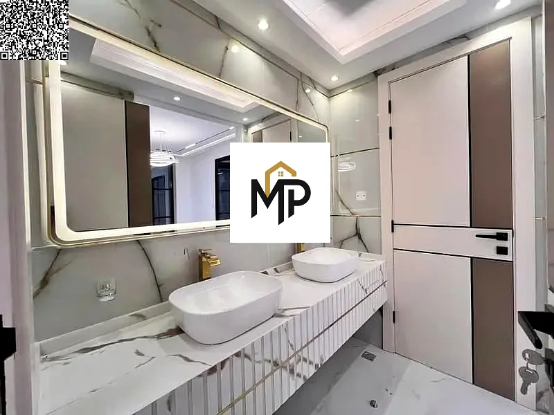 Hurry up and book your villa, ready with the key, including registration fees, freehold, in the most prestigious location in Al Helio, Ajman63904952143619114