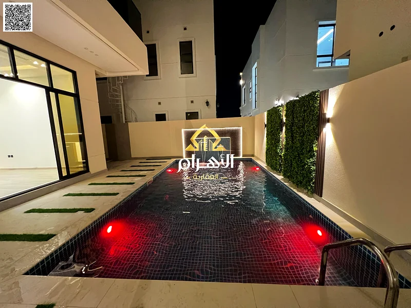 فيلا للبيع مكونة من طابقين مع فناء كبير - متضمنة رسوم التسجيل ونقل الملكية - بالقرب من طريق الشيخ محمد بن زايد - ملكية حرة63903823306883114