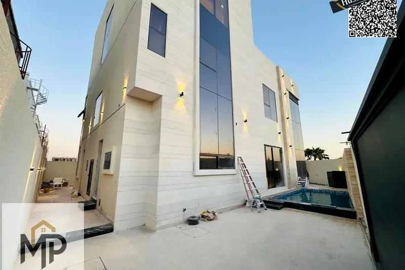 Villa for sale, corner, with personal finishing, with a private pool, a very distinguished location, including registration fees, opposite the mosque,63904465099522114