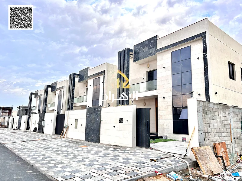 For sale, a two-story villa with a large courtyard - including registration and ownership fees - close to Sheikh Mohammed bin Zayed Road - freehold fo63903823298306110