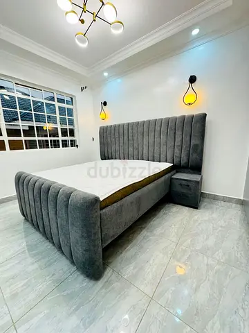 Stylish and Modern Upholstered Bed with Nightstand