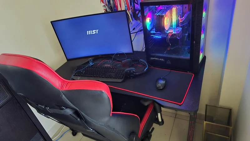 High end Gaming Desktop Setup with RGB and High-Performance Gear with gaming table and gaming chair63228828696577110