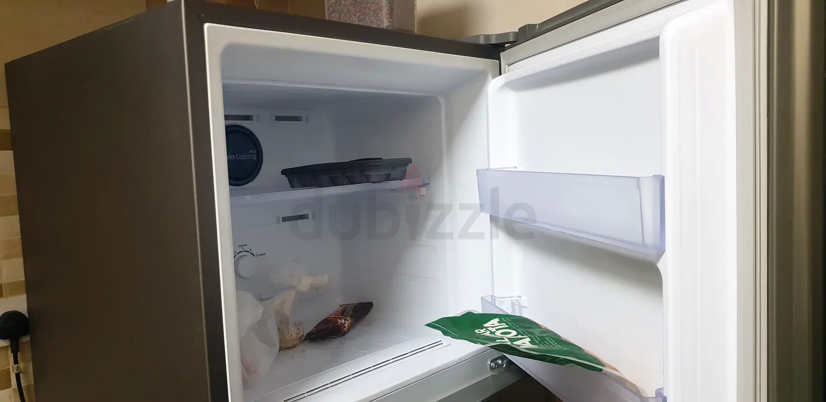 Compact and Efficient Refrigerator for Sale!