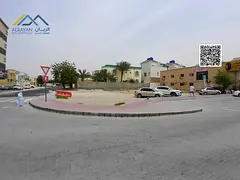 Commercial land, corner of two streets, directly on Sheikh Ammar Street, area 9,700 square feet