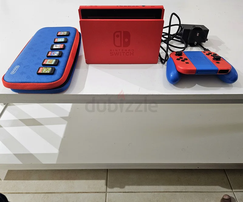 Unlock Endless Fun with the Nintendo Switch - Mario Red  Blue Edition!63231197347201113