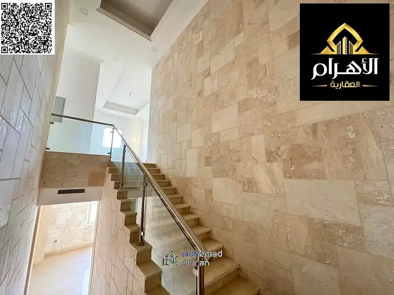 European style villa in Al Alia area for sale now 6 master bedrooms with elevator including registration, property fees, water etc. and air conditioni63872557950209114