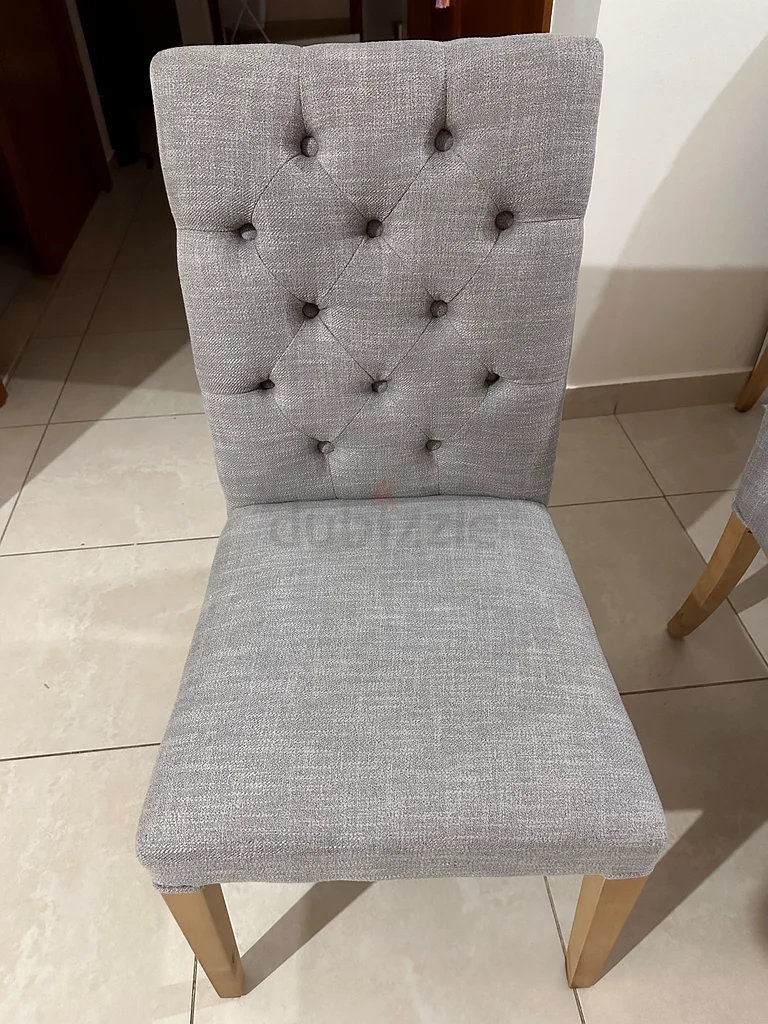 lovely almost brand new home center dining chairs.unit price 100 aed.4 chairs available. perfecf for63216349482113110