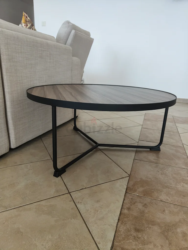 طاولة قهوة دائرية أنيقة بتصميم عصري63185231346562111