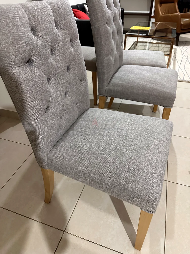 lovely almost brand new home center dining chairs.unit price 100 aed.4 chairs available. perfecf for63216349482113111
