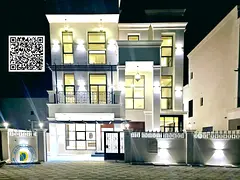 Luxury villa, modern design, 3 floors, roof and swimming pool for sale in Al Zahya, Ajman, at a very