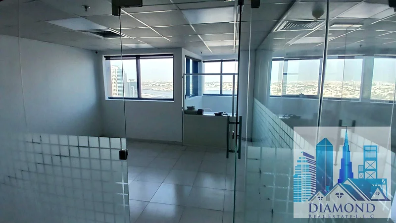 Vacant office with full water view of Ajman Creek for sale in cash in Falcon Towers B1, Al Rashidiya 2, Ajman.631846925904661119