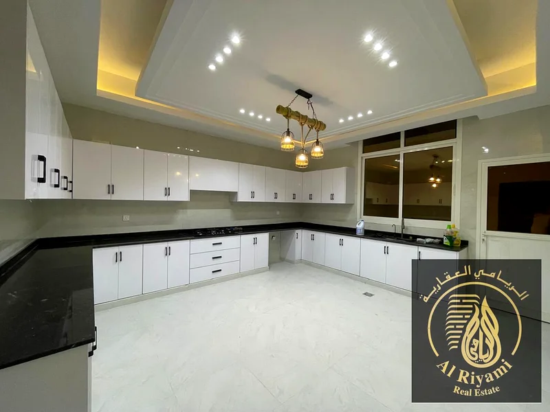 Two villa townhouses for sale in Al Zahia   Ground + first + roof facing stone63251322004995114