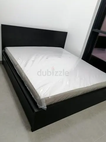 IKEA malam double size 140/200 bed with IKEA mattress and 2 storage drawers underneath is available