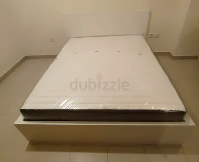 IKEA malam king size 180/200bed with IKEA mattress and 2 storage drawers underneath is available in