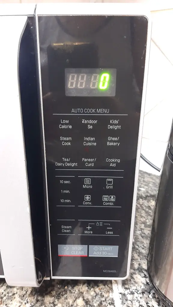 Microwave and oven.63248756650626114