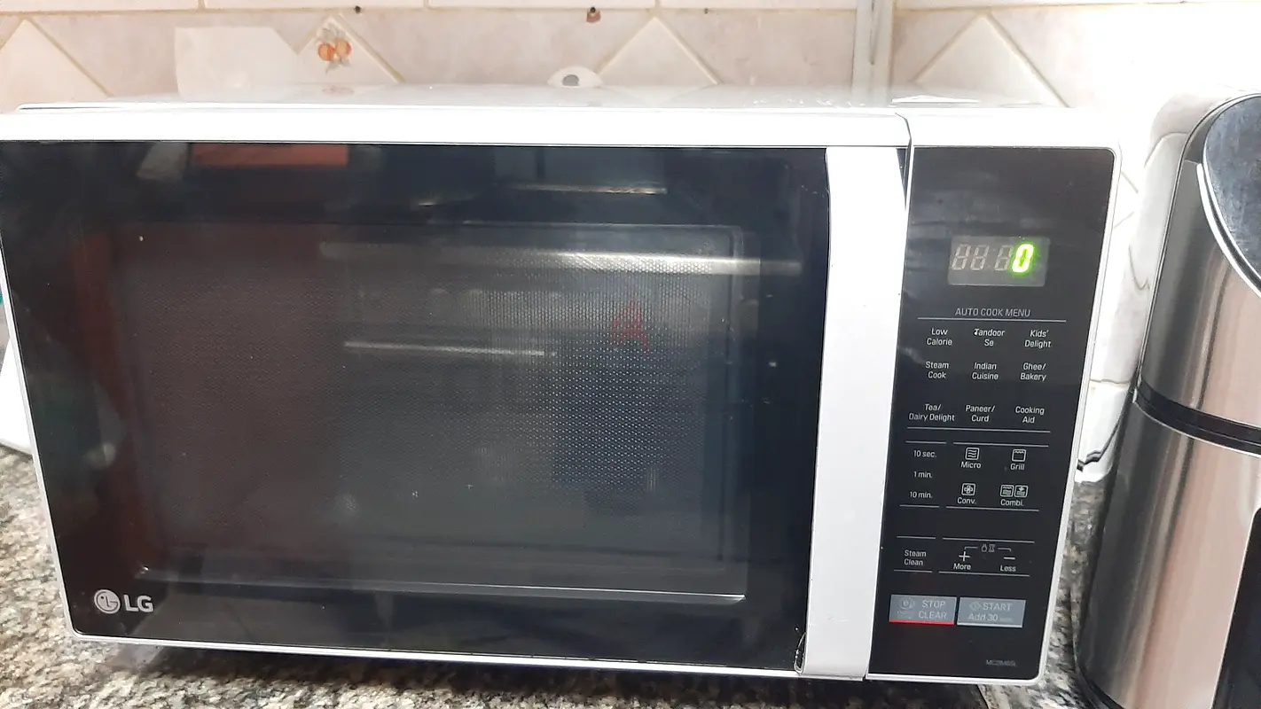 Microwave and oven.63248756650626111