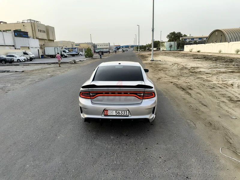 شاحنة دودج شاحن SXT لعام 2021 مع طقم SRT - إصدار أسود63135495538947114