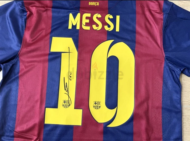 قميص ليونيل ميسي الموقع من موسم 2014/15 (شهادة أصالة Icons)632093437155851125