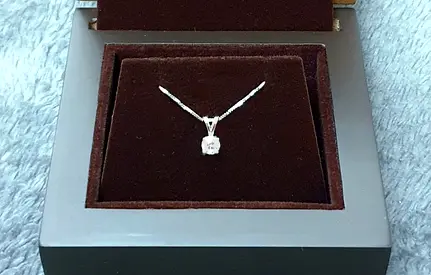 Diamond with 18 carat white gold pendant and chain