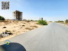 residential commercial land G + 4 excellent location Al Alia global city