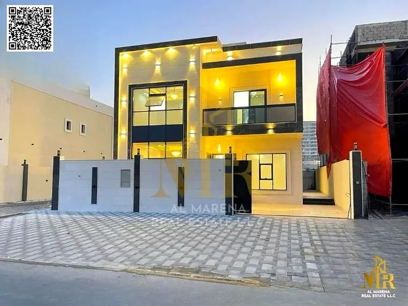 فيلا بسعر شامل لرسوم الكهرباء والمياه، تقع في الشارع الرئيسي، جاهزة للسكن فورًا في أكثر مناطق عجمان رقيًا، ملكية حرة63883480251650110