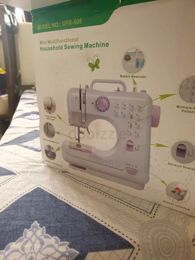 Compact and Stylish Sewing Machine for Quick Repairs!63253973212033111