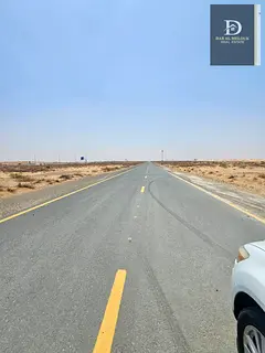 For Sale in Sharjah Rawdat Al Qurt Area Residential Land Street and Track Prime Location Close to Al