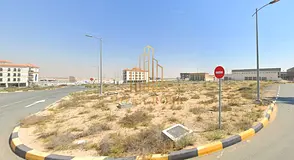 Commercial land in a golden location on 3 streets - garden view - close to schools and services