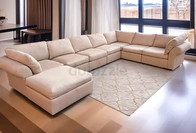Selling great condition pottery barn modular sofa beige with ottoman