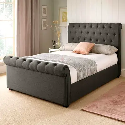 Stylish Gray Upholstered Bed with Elegant Tufted Headboard